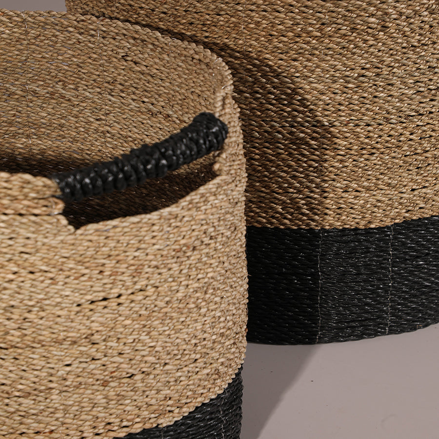 Handwoven seagrass storage basket,
Natural and black woven basket, Eco-conscious woven home décor , Durable natural fiber basket, Hand-braided storage hamper, Sturdy handmade basket for laundry or blankets, Decorative woven bin for modern interiors.