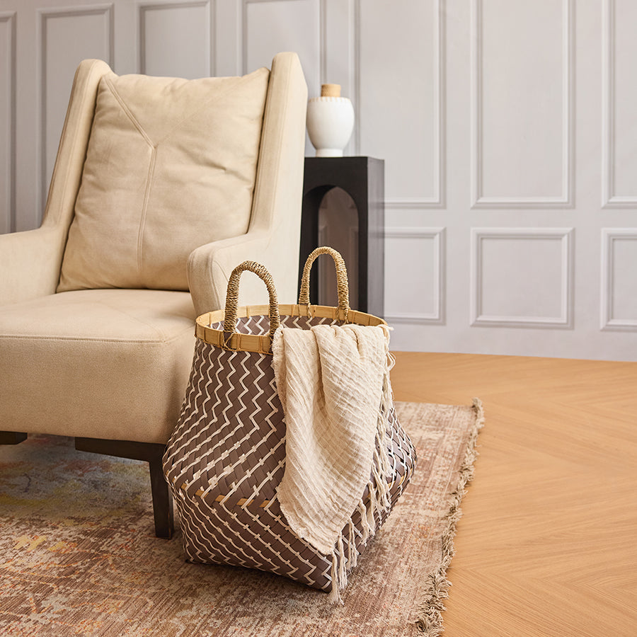 Cozy living room décor, Modern home accents, Stylish home organization, Zigzag patterned storage basket, Woven decorative bin, Stylish indoor basket, Cream throw blanket, Soft textured blanket,
Lightweight woven throw, Decorative couch throw.