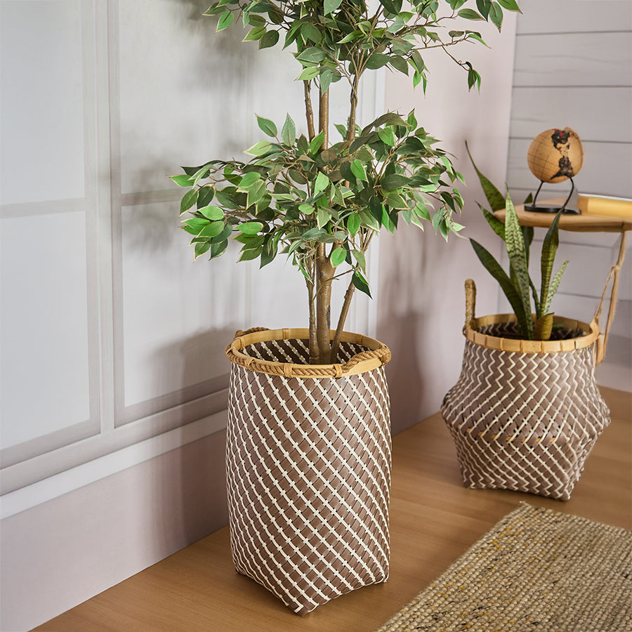 Woven indoor planter basket, Brown and white rattan basket, Eco-friendly plant holder, Decorative bamboo planter, Handwoven plant basket, Boho style basket for plants, Natural fiber indoor pot cover, Wicker planter basket, Handcrafted basket for indoor plants, Decorative plant basket for living room, Eco-conscious woven plant container, Bohemian woven basket planter cover, Stylish rattan planter for home décor, Plant pot cover basket with handles, Indoor tree planter basket.