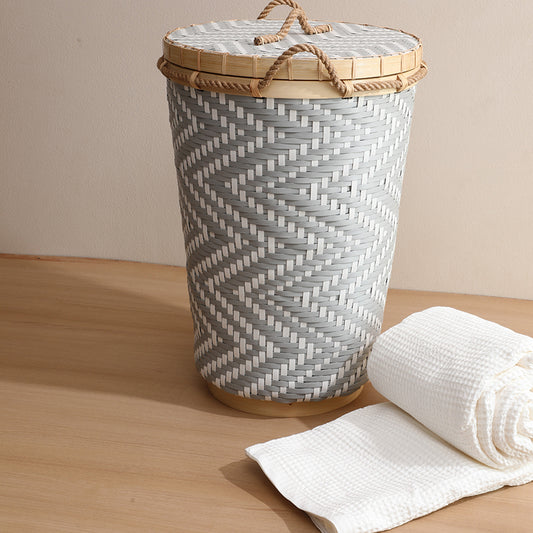Woven laundry basket, Decorative laundry hamper, Handwoven storage basket, Eco-friendly laundry basket, Bamboo basket with lid, Grey and white woven laundry hamper, Lidded storage basket for laundry, Handmade woven clothes hamper, Stylish woven basket for home décor,
Natural material laundry storage bin.