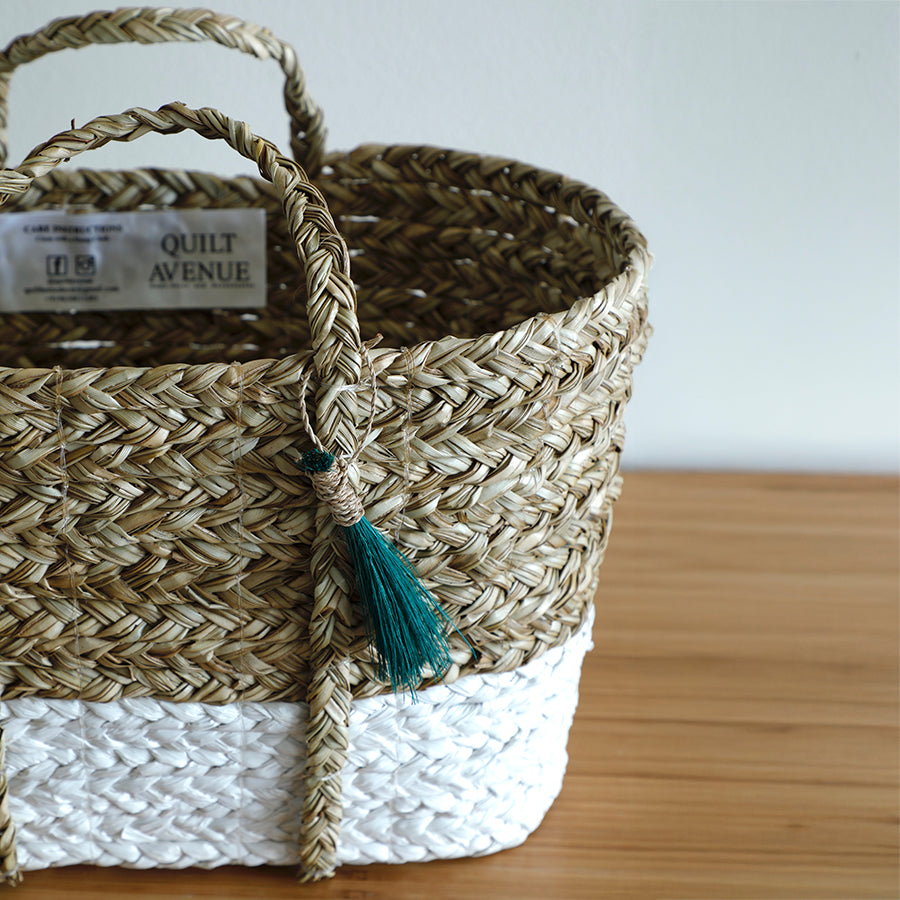 Small woven storage basket, 
Handwoven tabletop basket with handles, Two-tone Natural fiber hand-braided basket, Eco-friendly small storage bin white dipped seagrass basket, Desk organizer woven basket, Basket for keys, remotes, or toiletries.

