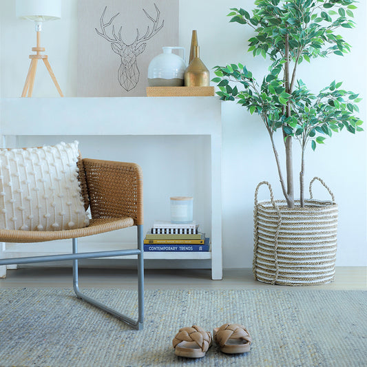 natural white braided storage basket, woven rope basket with handles, 
decorative indoor plant basket, 
eco-friendly jute and cotton basket, Scandinavian interior décor, 
cozy modern living room inspiration, 
minimalist home storage solutions, 
indoor plant décor with baskets, 
natural fiber home accessories, 
earthy tone living room décor.